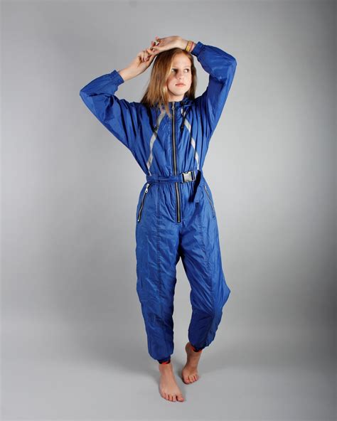 Be the Envy of the Slopes with a Peacock Blue Snowsuit
